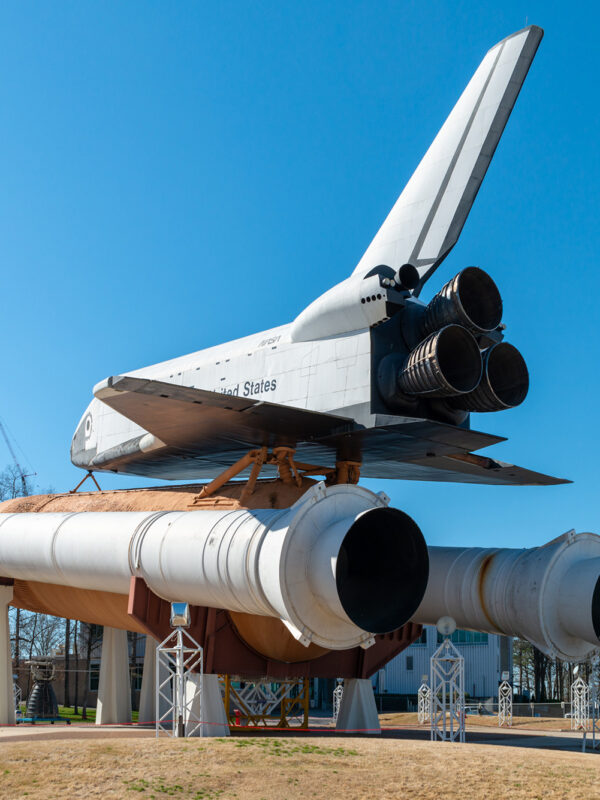 A space rocket with boosters on display outside NASA on a Space Camp in the USA