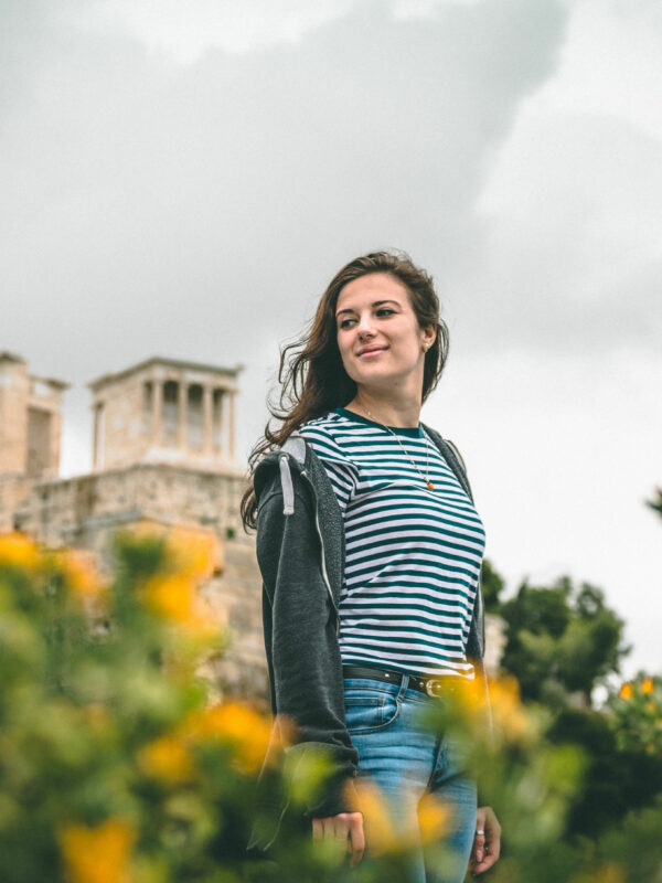A student exploring n historical site in Greece on a school tour