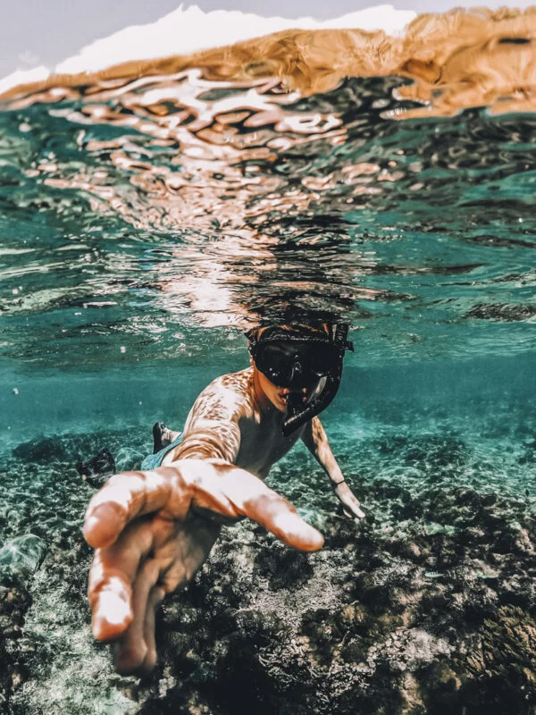 A student snorkelling in Southern Tanzania on a school expedition