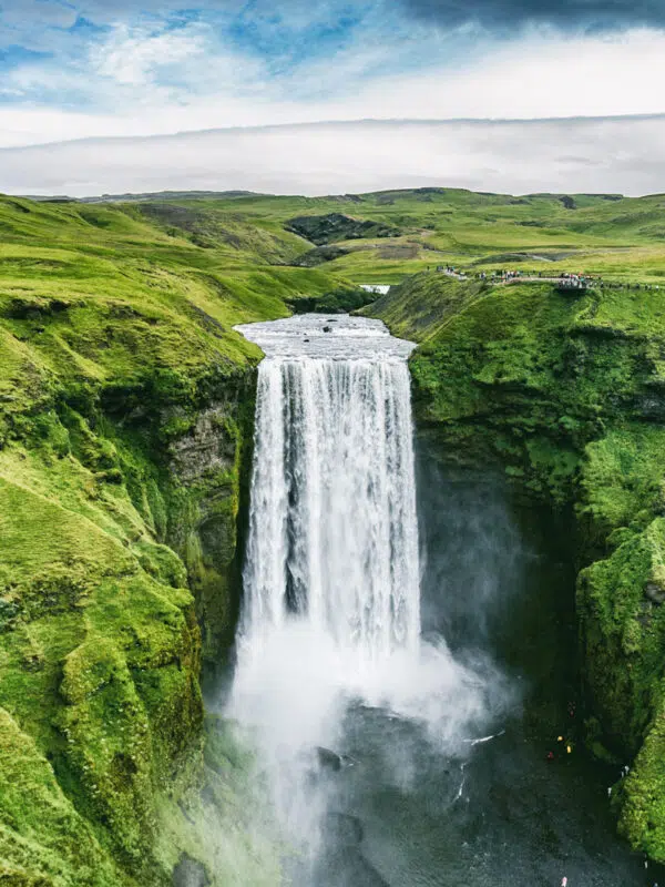 Skogafoss Waterfall in Iceland on a school geography field trip