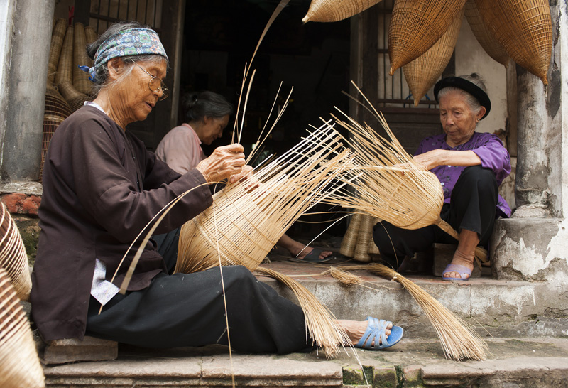 Visiting basket Weavers in the Vietnam Countryside on a school expedition