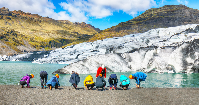 Students getting ready to explore a glacier on a geography field trip to Iceland