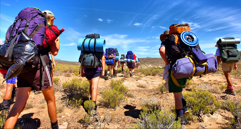 Students trekking on an overseas school expedition