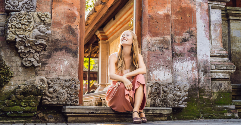 A student exploring a temple on an overseas school trip